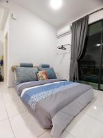 The Sun 1 or 3BR Bayan Lepas 4 to 10 pax WLにあるベッド