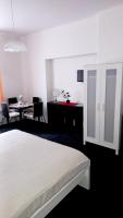 Postel nebo postele na pokoji v ubytování Apartmány Karlštejn