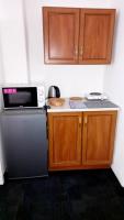Kuchyň nebo kuchyňský kout v ubytování Apartmány Karlštejn