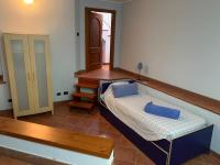 A bed or beds in a room at Villa Delfino Blu con accesso diretto al mare dalla scogliera e privacy impagabile.