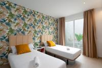 A bed or beds in a room at Villa Sapphire by Villa Plus