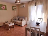Posedenie v ubytovaní Apartamentos El Mirador