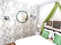 Posteľ alebo postele v izbe v ubytovaní Apartamentos El Mirador