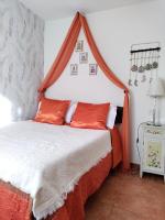 Posteľ alebo postele v izbe v ubytovaní Apartamentos El Mirador