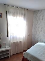 Posteľ alebo postele v izbe v ubytovaní Apartamentos El Mirador