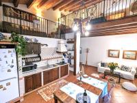 A kitchen or kitchenette at La Casa Delle Fate
