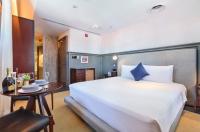 Ann Siang House, The Unlimited Collection managed by The Ascott Limitedにあるベッド