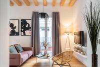 Televízia a/alebo spoločenská miestnosť v ubytovaní Lola 14 Suite Apartment