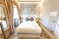 Posteľ alebo postele v izbe v ubytovaní Hospedium Hotel Barómetro de Camariñas