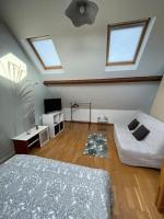 Łóżko lub łóżka w pokoju w obiekcie Duplex tout confort dans Boulogne