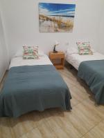 Postel nebo postele na pokoji v ubytování San Sebastián 65