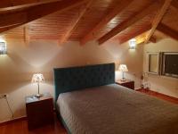 Posteľ alebo postele v izbe v ubytovaní Nafplio cozy maisonette
