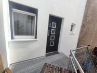 a stairway with a door and a window at Gästehaus im Alten Fährhaus in Cochem