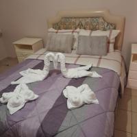 Postel nebo postele na pokoji v ubytování Apartment Mitrou 2