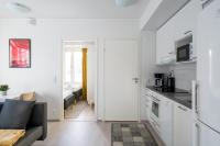 Kuchyň nebo kuchyňský kout v ubytování Hiisi Homes Kirkkonummi Masala Seppä-Kallen kuja