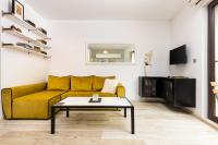 A television and/or entertainment centre at Luxury Central Apartment