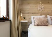 A bed or beds in a room at Luxury Central Apartment