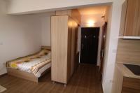 Postel nebo postele na pokoji v ubytování Apartments in Lotos Complex