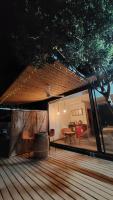 a view of a deck with a table and chairs at Apalta Lofts, disfruta frente a viñedos in Santa Cruz
