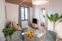 TV a/nebo společenská místnost v ubytování Feelathome Stadium Apartments