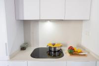 Kuchyň nebo kuchyňský kout v ubytování Feelathome Stadium Apartments