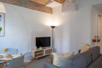 TV a/nebo společenská místnost v ubytování Feelathome Stadium Apartments