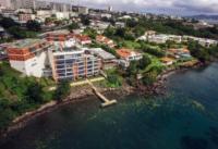 an aerial view of a city and the water at Superbe appartement vue mer - résidence de standing in Schœlcher