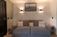 Posedenie v ubytovaní MC Tourisme - Splendide & cosy appartement avec piscine, tennis & parking