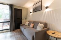 Posedenie v ubytovaní MC Tourisme - Splendide & cosy appartement avec piscine, tennis & parking