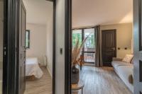 Posteľ alebo postele v izbe v ubytovaní MC Tourisme - Splendide & cosy appartement avec piscine, tennis & parking