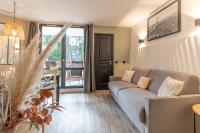 Posedenie v ubytovaní MC Tourisme - Splendide & cosy appartement avec piscine, tennis & parking
