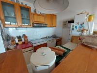 Kuchyňa alebo kuchynka v ubytovaní Grau d'Agde : Appartement 3 pièces avec terrasses à 20m de la plage - FR-1-423-265