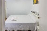 A bed or beds in a room at Apartment Triana