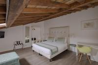 Posteľ alebo postele v izbe v ubytovaní Palazzo Lupardi Relais