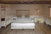 Posteľ alebo postele v izbe v ubytovaní Palazzo Lupardi Relais