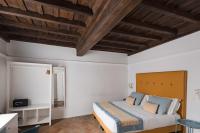 Posteľ alebo postele v izbe v ubytovaní Palazzo Lupardi Relais