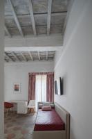 Televízia a/alebo spoločenská miestnosť v ubytovaní Palazzo Lupardi Relais