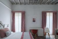 Posteľ alebo postele v izbe v ubytovaní Palazzo Lupardi Relais