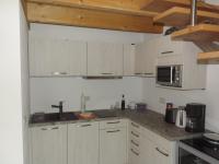 Ferienhaus Am Waldrand - "Libelle"にあるキッチンまたは簡易キッチン