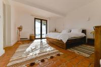 Posteľ alebo postele v izbe v ubytovaní La Villa Deluxe une propriété d'Exception sur les hauteurs d'Ajaccio