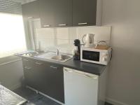 Kuchyňa alebo kuchynka v ubytovaní Studio apartman Valentina