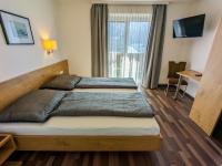 Łóżko lub łóżka w pokoju w obiekcie Appartement Haus Talblick