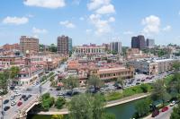 a view of a city with cars on a street at The Raphael Hotel, Autograph Collection in Kansas City