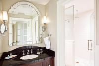 a bathroom with a sink and a shower at The Raphael Hotel, Autograph Collection in Kansas City