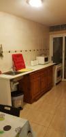 Kuchyň nebo kuchyňský kout v ubytování A Ensuite Apartment con Zona de Patio