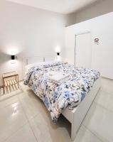 A bed or beds in a room at d annunziohouse