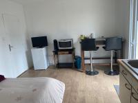 Telewizja i/lub zestaw kina domowego w obiekcie Studio proche bordeaux