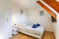 Cama ou camas em um quarto em Magnifique maison au coeur de Deauville 6P CLAIREFONTAINE