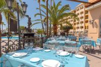 A restaurant or other place to eat at Hotel IPV Palace & Spa - Adults Recommended