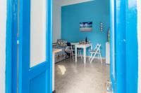 Telewizja i/lub zestaw kina domowego w obiekcie SyracuseApartments IL PASUBIO di SIRACUSA Stupendo appartamento vicino ad ORTIGIA a 200m dal MARE